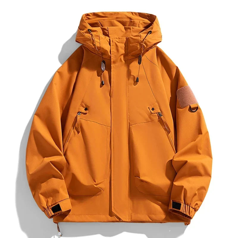 Jackets : Coupe-Vent Homme à Capuche Imperméable dans Orange de Roselva
