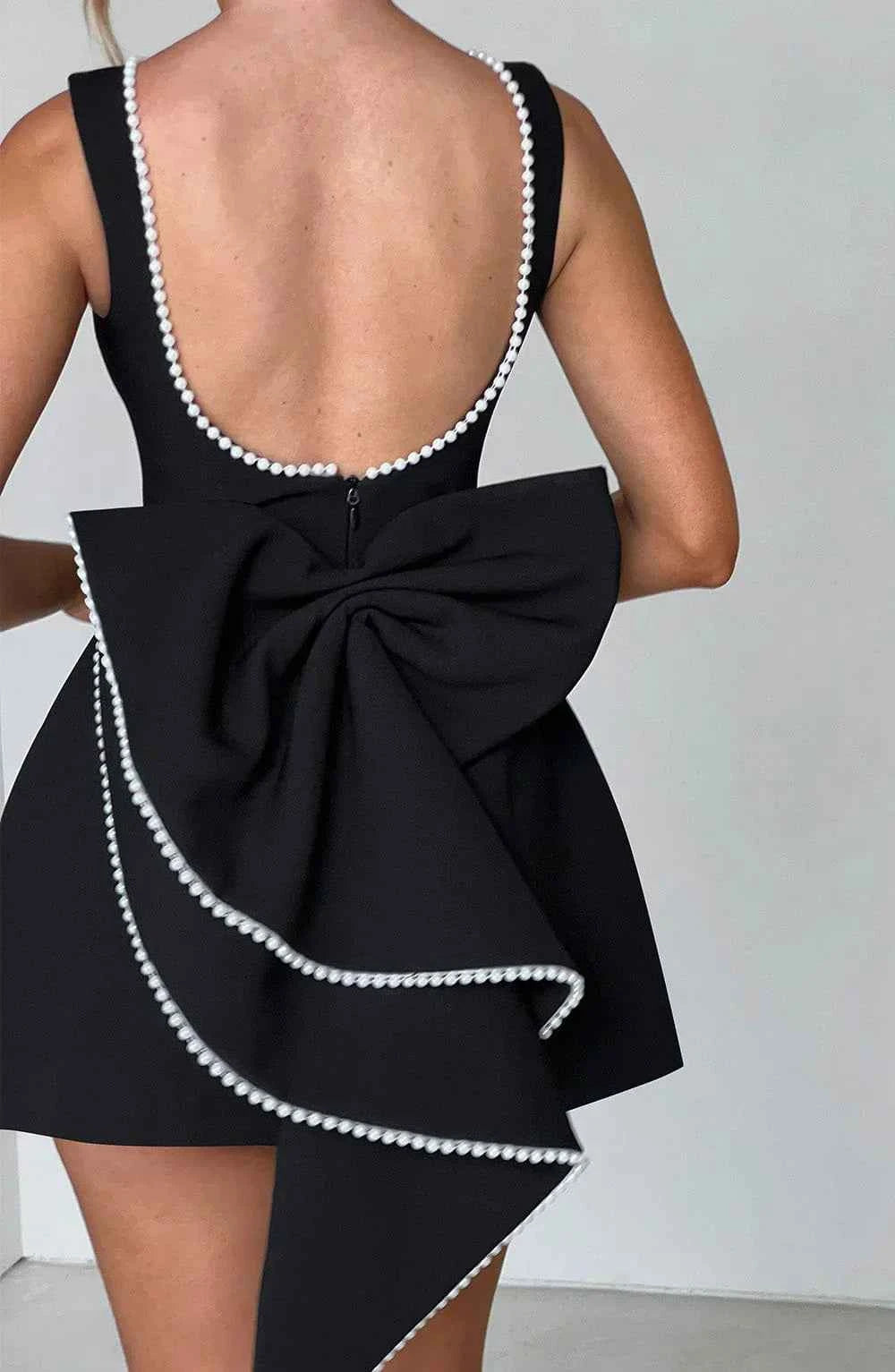 Mini dresses : Robe courte femme dos nu avec nœud, élégante et fluide dans de Marche Lino