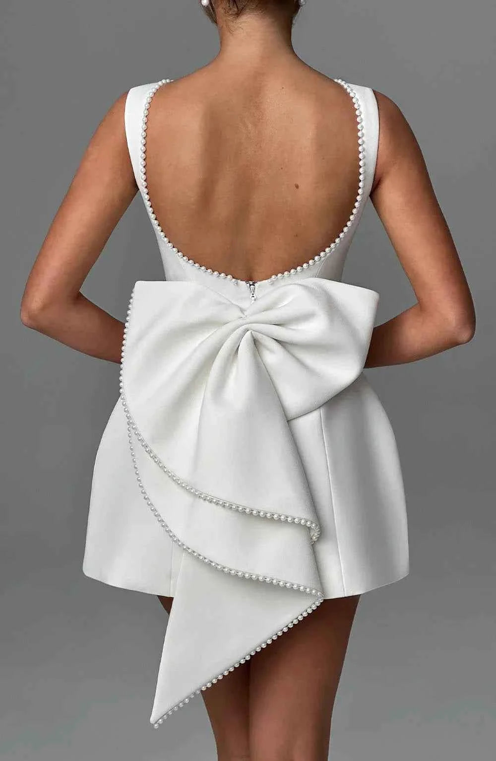 Mini dresses : Robe courte femme dos nu avec nœud, élégante et fluide dans de Marche Lino